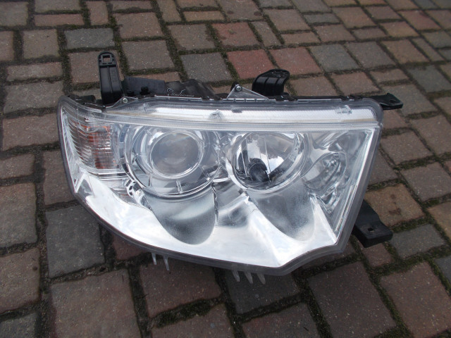 Reflektor правое lampa правая pajero sport zwykla