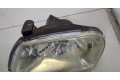 Фара передняя Mitsubishi L200 1996-2006 левая