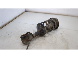 Стойка амортизатора Mitsubishi Colt 1996-2004