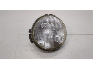 Фара передняя Mitsubishi Pajero 1982-1991 левая