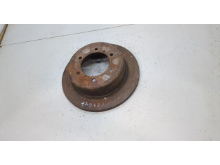 Диск тормозной Mitsubishi Montero Sport / Pajero Sport 1996-2008 задний MB618797