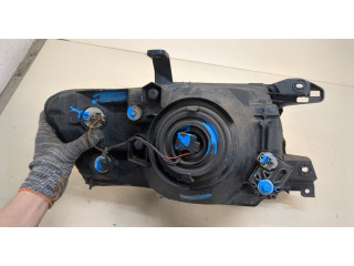 Фара передняя Mitsubishi Pajero / Montero 2000-2006 левая