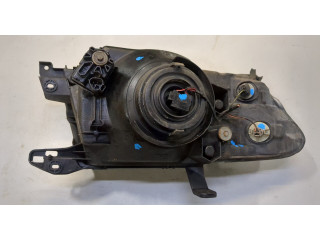 Фара передняя Mitsubishi Pajero / Montero 2000-2006 левая