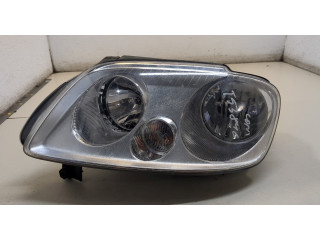 Фара передняя Volkswagen Caddy 2004-2015 левая