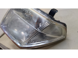 Фара передняя Nissan Pathfinder 2004-2014 левая