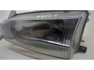 Фара передняя Toyota Corolla 1992-1997 левая