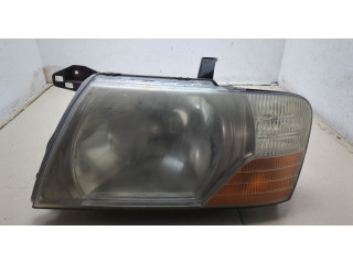 Фара передняя  Mitsubishi Pajero / Montero 2000-2006 левая 