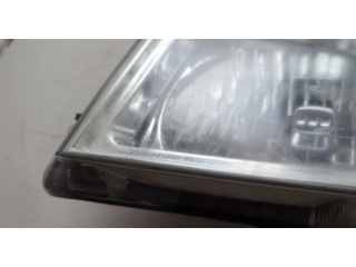 Фара передняя Nissan Pathfinder 2004-2014 левая