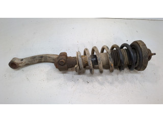 Стойка амортизатора  SsangYong Rexton 2012-2017      