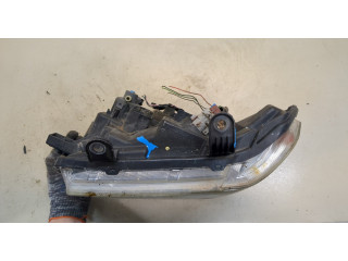 Фара передняя Nissan Pathfinder 2004-2014 левая