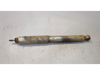 Стойка амортизатора  Suzuki Jimny 1998-2012      