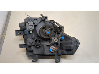 Фара передняя Nissan Pathfinder 2004-2014 левая