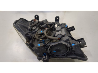 Фара передняя Nissan Pathfinder 2004-2014 левая