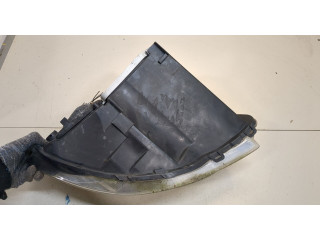 Фара передняя  Chrysler Voyager 2001-2007 левая 