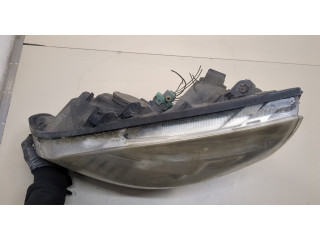 Фара передняя Renault Scenic 2003-2009 левая