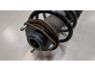 Стойка амортизатора Mitsubishi Outlander 2012-2015 гибрид