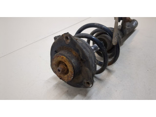 Стойка амортизатора Volkswagen Caddy 2004-2010