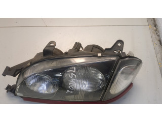 Фара передняя  Toyota Avensis 1 1997-2003 левая 