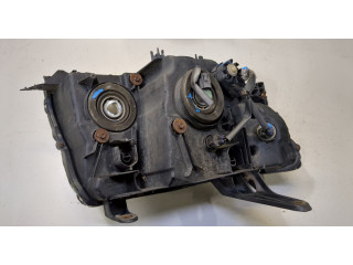 Фара передняя Mitsubishi Pajero 2006-2011 левая