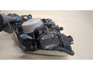 Фара передняя Nissan Pathfinder 2004-2014 левая