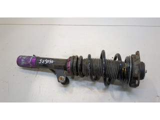 Стойка амортизатора  Volkswagen Caddy 2010-2015      