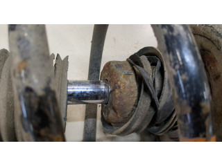 Стойка амортизатора Mitsubishi Outlander 2012-2015 гибрид