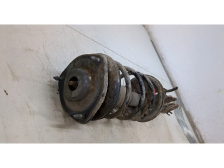 Стойка амортизатора Mitsubishi Colt 1996-2004