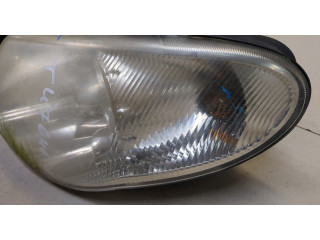 Фара передняя  Chrysler Voyager 2001-2007 левая 