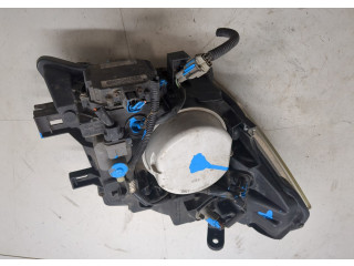 Фара передняя Nissan Pathfinder 2004-2014 левая