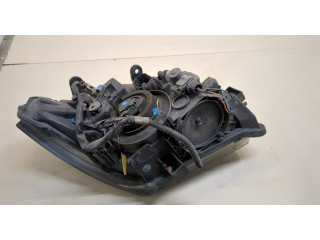 Фара передняя Nissan Pathfinder 2004-2014 левая