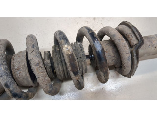 Стойка амортизатора Mitsubishi Pajero 2006-2011