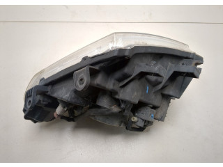 Фара передняя Nissan Pathfinder 2004-2014 левая