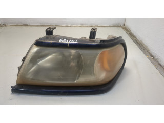 Фара передняя Mitsubishi Montero Sport / Pajero Sport 1996-2008 левая