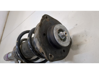 Стойка амортизатора  Volkswagen Caddy 2010-2015      