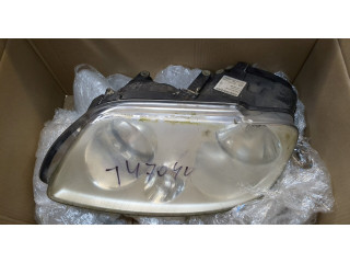 Фара передняя  Volkswagen Caddy 2004-2010 левая 