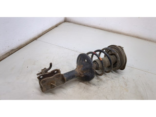 Стойка амортизатора  Mitsubishi Colt 1996-2004      