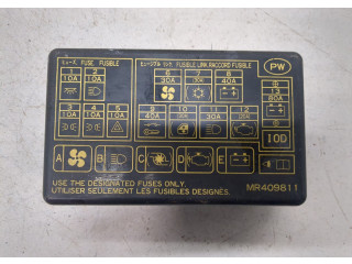 Крышка блока предохранителей  Mitsubishi Montero Sport / Pajero Sport 1996-2008      MR409811   