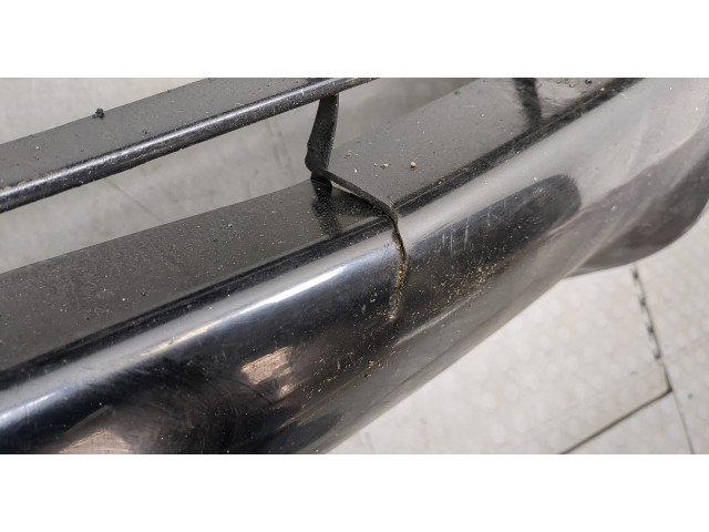 Бампер Mitsubishi Montero Sport / Pajero Sport 1996-2008 передний 6400A220