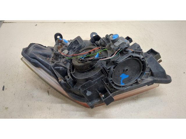 Фара передняя Nissan Pathfinder 2004-2014 левая