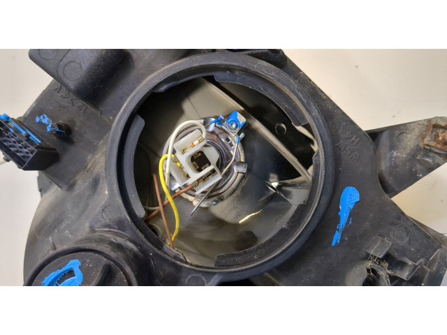 Фара передняя  Peugeot Partner 2002-2008 левая 