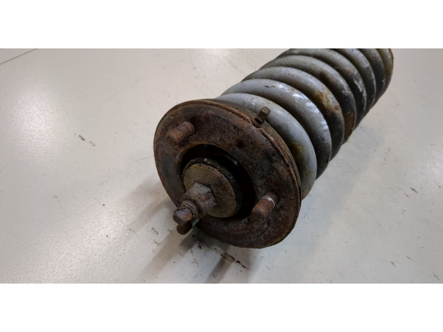 Стойка амортизатора Nissan Pathfinder 2004-2014