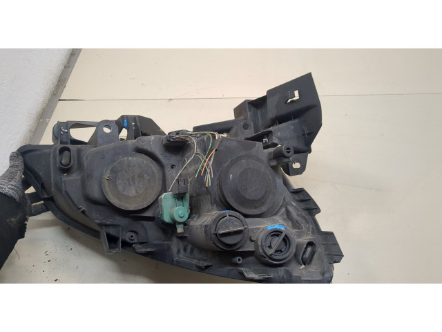 Фара передняя Renault Scenic 2003-2009 левая
