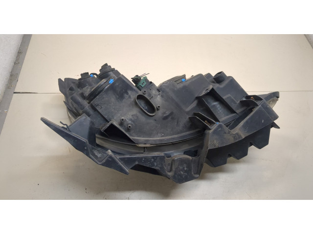 Фара передняя Renault Scenic 2003-2009 левая