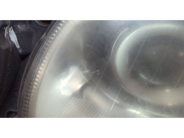 Фара передняя Mercedes E W211 2002-2009 левая