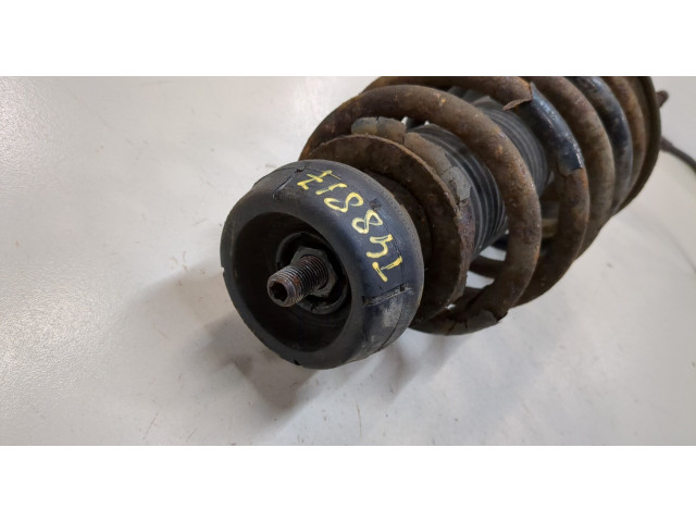 Стойка амортизатора  Skoda Octavia Tour 2000-2010      