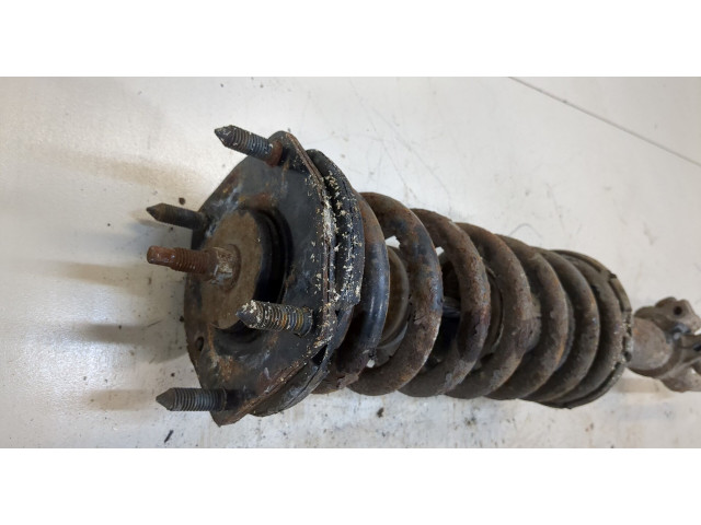 Стойка амортизатора  Jeep Commander 2006-2010      