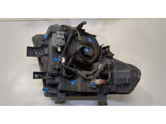 Фара передняя Nissan Pathfinder 2004-2014 левая