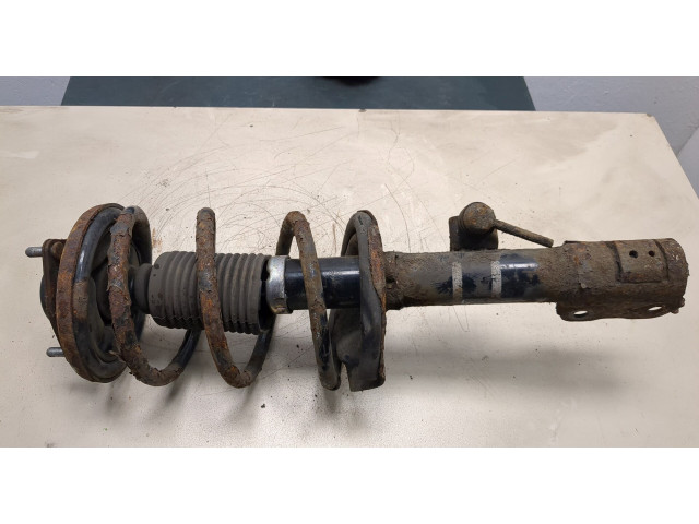 Стойка амортизатора Mitsubishi Outlander XL 2006-2012