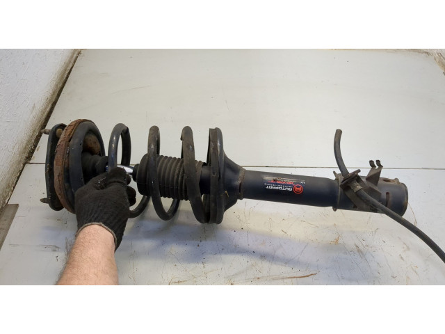 Стойка амортизатора  Mitsubishi Outlander 2003-2009 MN133394, MN101529     