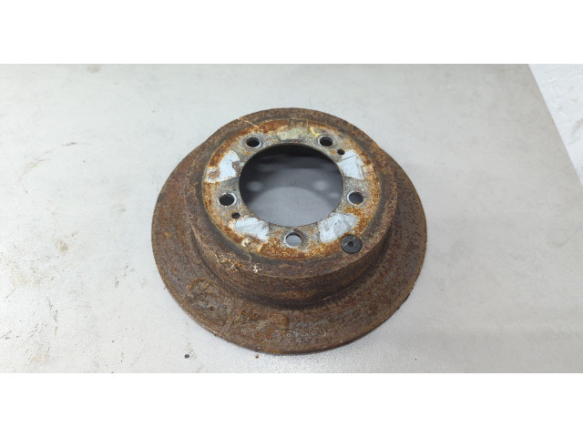 Диск тормозной Mitsubishi Pajero Pinin 1998-2006 задний